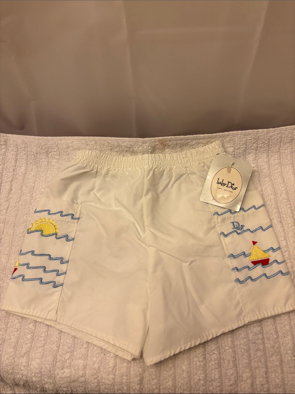 BABY DIOR White Embroidered Sailboat Shorts with Yellow and Red Accents